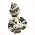 long haired gray and white cat toothpick holder